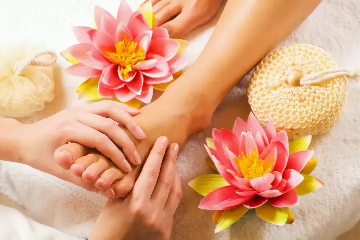 Massaging in pedicure treatment